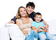 Happy young family with pretty child