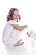Photo of adorable young girl on white background Photo of adorable young girl on white background