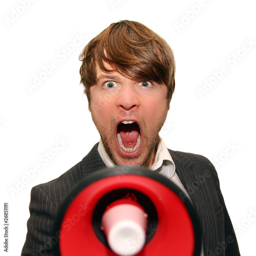 Foto: businessman shouting into bullhorn isolated on white businessman shouting into bullhorn isolated on white