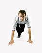 Foto: Businessman in sprint position Businessman in sprint position