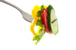 fork with fresh vegetables and oil drops