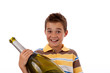 Photo: Junge mit großer Champagner Flasche Junge mit großer Champagner Flasche