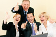 Businesspeople in office having great success