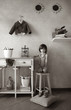 Little boy, sitting on stool Little boy, sitting on stool