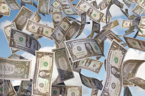 Illustration: dollar bills flying in the sky dollar bills flying in the sky