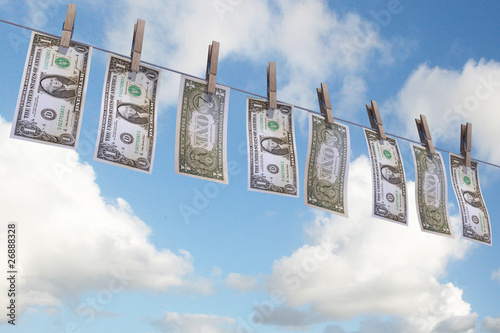 Photo: dollars on clothing line dollars on clothing line