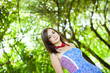 Girl by the greenery