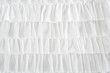 pleated skirt fabric fashion in white closeup