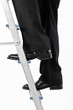 Business man climbing ladder