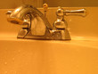 close up shot of a faucet in the bathroom