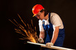 Image : worker cutting metal