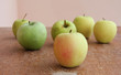 Ripe apples on the wood structure Ripe apples on the wood structure