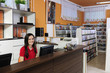 Woman working at the video rental store