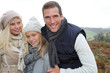 Closeup of happy family in fall season