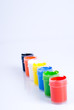 Colored paints on a white background Colored paints on a white background