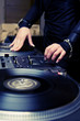 Female rnb deejay playing turntables
