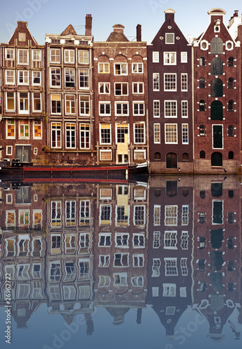 Photo: typical amsterdam houses reflected in the canal typical amsterdam houses reflected in the canal