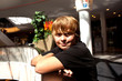 smiling boy inside a center