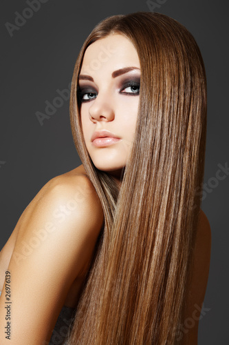 Wellness. Portrait of woman model with shiny long brown hair