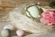 Easter egg with rose in the nest