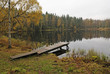 Fishing bridge in rainy autumn day