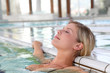 Closeup of beautiful woman in spa center