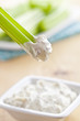 green celery sticks with tasty dip