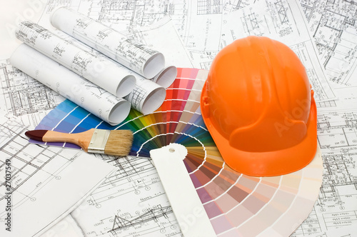 Photo: Color samples for selection with house plan on background Color samples for selection with house plan on background