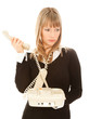 Beautiful businesswoman holding phone and looking sadness Beautiful businesswoman holding phone and looking sadness