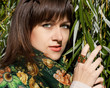 woman with leaves
