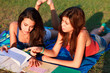 Teenage college students studying outdoor in university campus