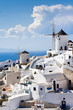 Traditional windmills in village Oia Cyclades island Santorini