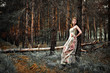 Portrait of romantic woman in fairy forest
