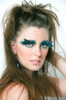 Female Model with extreme make up on a background