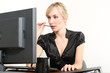 Business Woman in a Office with computer