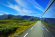 Mountain landscape with motion car on asphalt road Mountain landscape with motion car on asphalt road