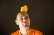 man with paper house
