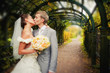 Portrait of newlyweds in autumn park in moscow estate