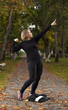 Attractive female athlete doing a victory pose.