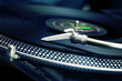 Turntable playing vinyl record Turntable playing vinyl record