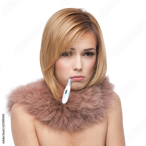 Foto: young blonde woman being ill and sad, with pink fur collar young blonde woman being ill and sad, with pink fur collar
