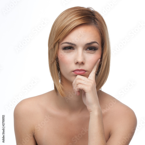 Foto: portrait of a young woman, thinking portrait of a young woman, thinking