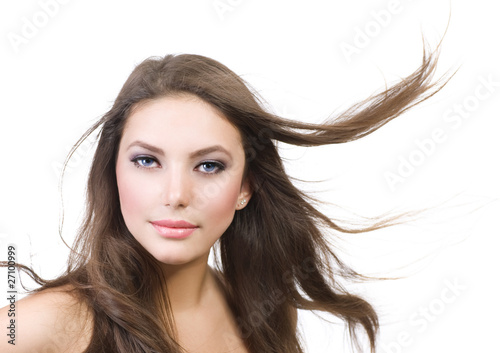 Photo: Beautiful Girl with long Hair.Isolated on white Beautiful Girl with long Hair.Isolated on white