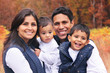 Photo: Happy family smiling autumn portrait Happy family smiling autumn portrait