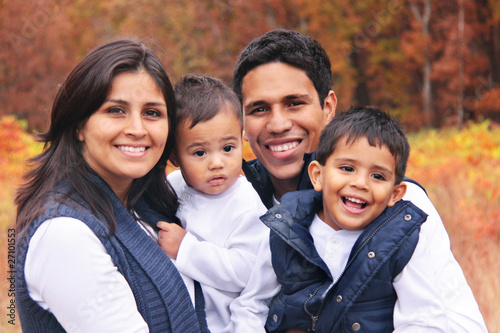 Happy family smiling autumn portrait