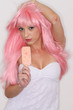 Female Model in Pink Wig Extreme Makeup with Ice Cream