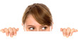Foto: Woman peeping over a blank billboard Woman peeping over a blank billboard