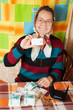 senior woman with  credit card