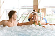 Swimming pool - couple relax in hot tub Swimming pool - couple relax in hot tub