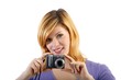 young beautiful woman with a camera (white background)